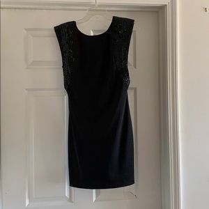 Black dress with sequin sleeves